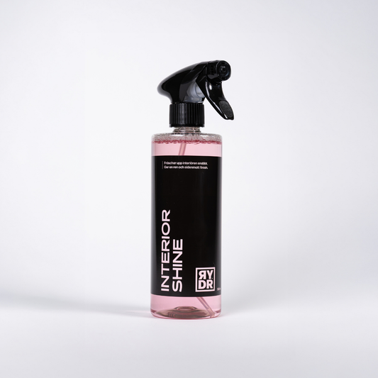 Genomskinlig sprayflaska med transparent rosa RYDR Interior Shine, 500ml.